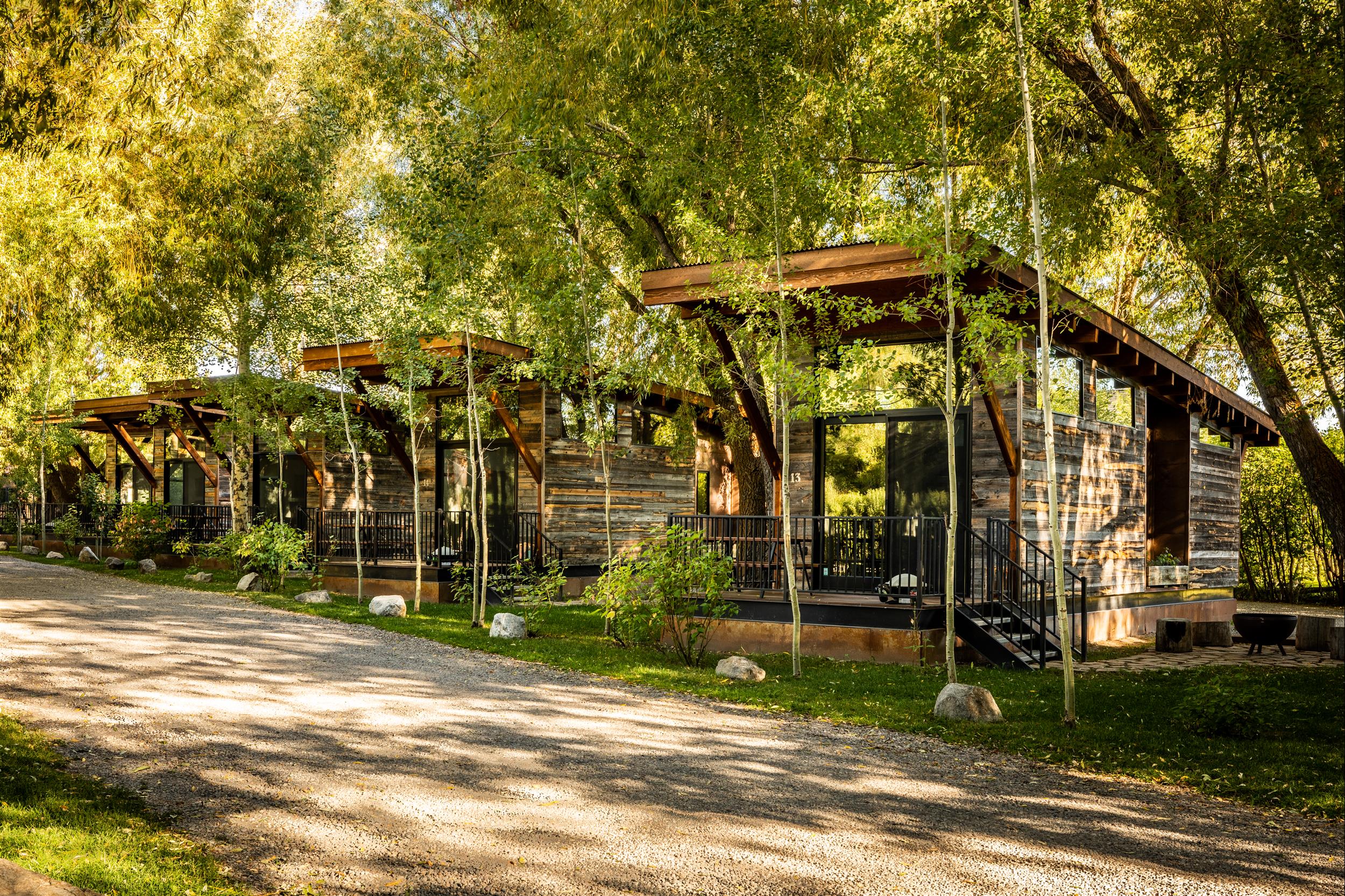 row of modern rustic chic cabins at Fireside Resort in Jackson Hole wyoming